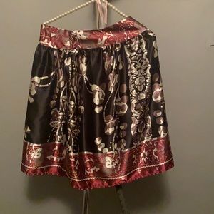 Apostrophe Skirt.   Shades of brown, pewter, cream and maroon.